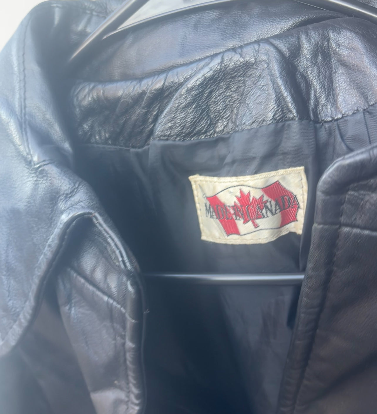 Canadian made Black Leather Jacket Brand Tag