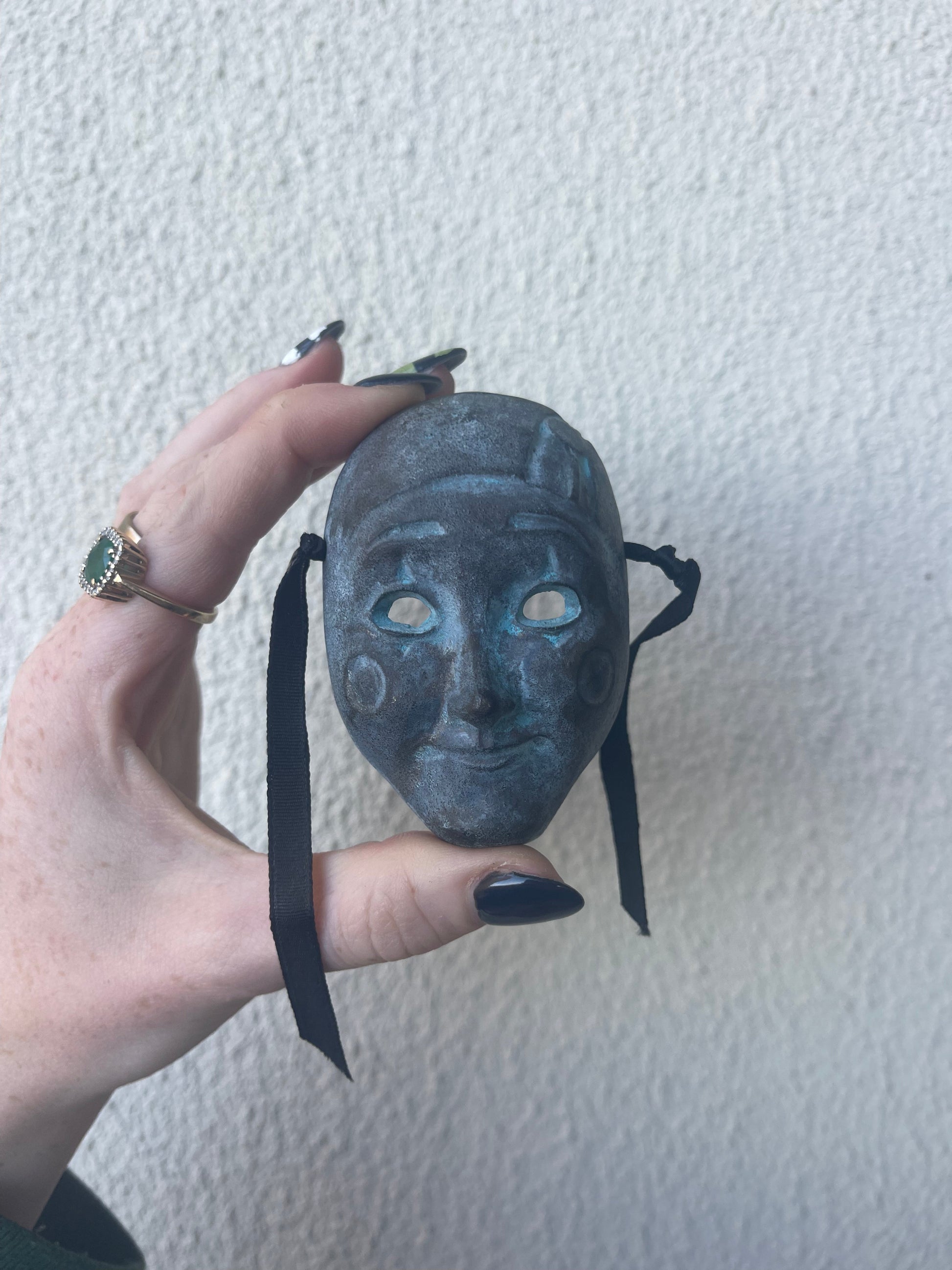 Vintage mini  metal masquerade mask trinket close up